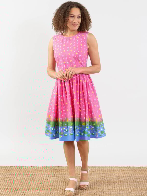 Dance in the sun in this flattering Chesil dress. Featuring Kite's lovely water lily print on lightweight poplin fabric, wearing this dress is sure to fill you with good times vibes! The softly gathered skirt, with a gorgeous, shaped bodice, gives a lovely fit and feel. Combined with delicate picot lace edging around the arm holes and a concealed back zip opening, this dress is definitely a seasonal stunner.