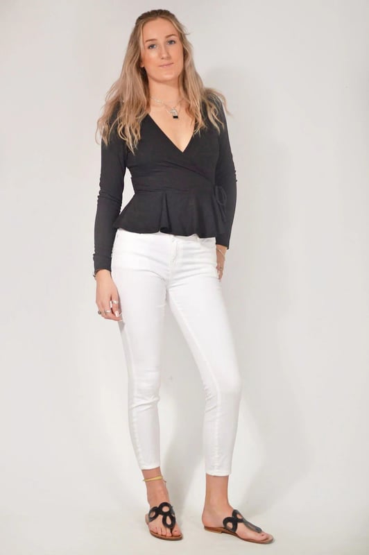 Wear day-to-night, this wrap top is the ultimate day to evening piece that never goes out of style. With an elegant gathered puff shoulder, fine rib detailing, this item will be a regular go to.  Sizing: As expected Length: 23" Shoulder to Hem
