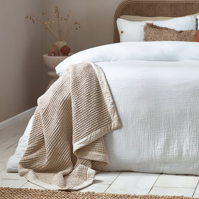 Inspired by timeless classic fabrics, the Lark duvet cover set is made from ultra-soft double-layer muslin cotton fabric. Available in a range of pastel tones, this bedding is complete with a wooden button closure. The cosy crinkle texture is perfect for bringing a relaxed, stylish feel to your bedroom. Cool and breathable in the summer months and snuggly and warm in the winter, muslin is used on both sides for an understated yet modern look. This product is certified by OEKO-TEX®, showing it has been sustainably made.