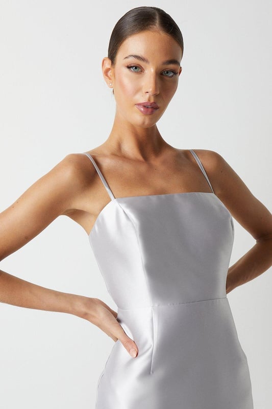 You name the occasion, we have the perfect dress. From maxi to mini and everything in between, find your dream dress to feel confident in. Choose classic shift dresses and flowing floor-length pieces for a timeless style, plus discover on-trend bardot and wrap dresses to wear on repeat. Style: Cami Twill Column Pencil Bridesmaids Dress.  Ideal for: Bridesmaids.  Model wears size UK 10 and is 5' 9" tall.