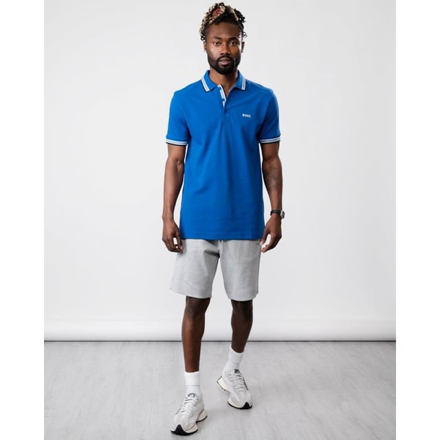 A signature polo shirt by BOSS Menswear, cut to a regular fit. Featuring contrast tipping and a logo at the left chest, this short-sleeved polo shirt is designed in cotton piqué and detailed with further BOSS branding at the undercollar.
Regular fit. Flat-knit collar. Number of buttons: 3. Short sleeves. Flat-knit cuffs. Standard length
100% Cotton
50469055
Model is 5"8 and wears size M