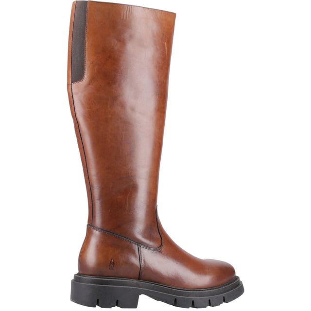 Met een klassieke look en een bovenwerk van kwaliteitsleer is deze laars perfect voor koudere dagen, met een knusse voering van textiel voor warmte en een flexibele, duurzame zool blijf je comfortabel en warm terwijl je er op je best uitziet.