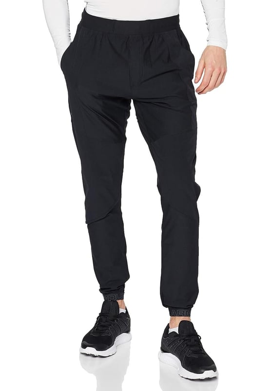 From the streets to the workout, rep these men's Vanish Track Pants from Under Armour. - - . These track pants are cut from smooth, durable poly fabric for lasting wear. - -. Comes In a Black and Grey colourway, they feature an elasticated waistband, with woven ankle cuffs to secure the fit. - -. Finished up with Under Armour branding around the cuffs, and a signature logo at the thigh. Machine washable. - -. Our model is 6'0" and wears medium size.