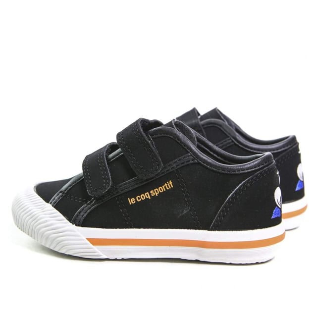 Basket Le Coq Sportif Deauville inf Jungen Schwarz Synthetik. Authentischer Schuh der Marke Le Coq Sportif - Streetwear/Sportswear Design von Le Coq Sportif - Le Coq Sportif für modebewusste Jungen, perfekt für den Alltag - Basket Le Coq Sportif in Schwarz lässt sich ideal mit der restlichen Garderobe kombinieren - bequeme Synthetikmaterialien - klassischer Klettverschluss - Deauville inf - Synthetik.