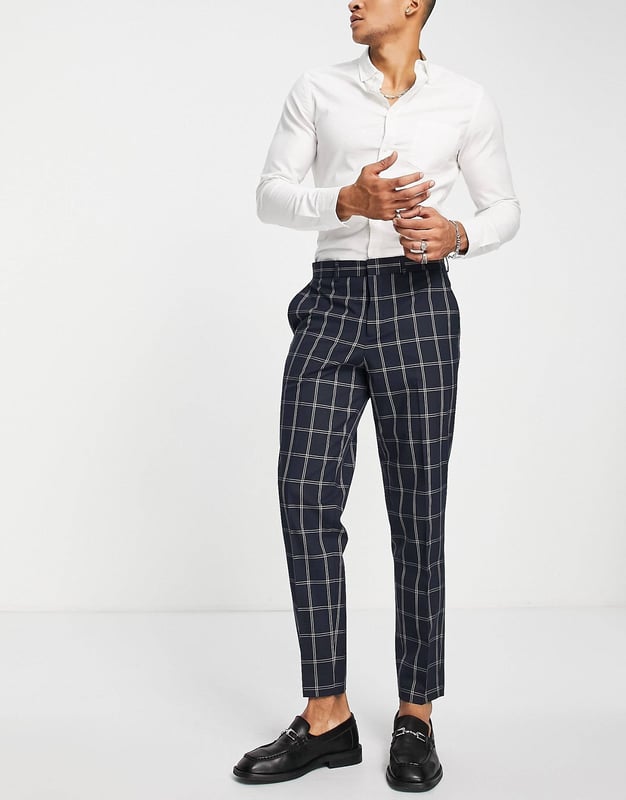 Product Details:

Check design
Regular rise
Belt loops
Side pockets
Button back pockets
Regular, tapered fit

Materials:

Main: 64% Polyester, 32% Viscose, 4% Elastane