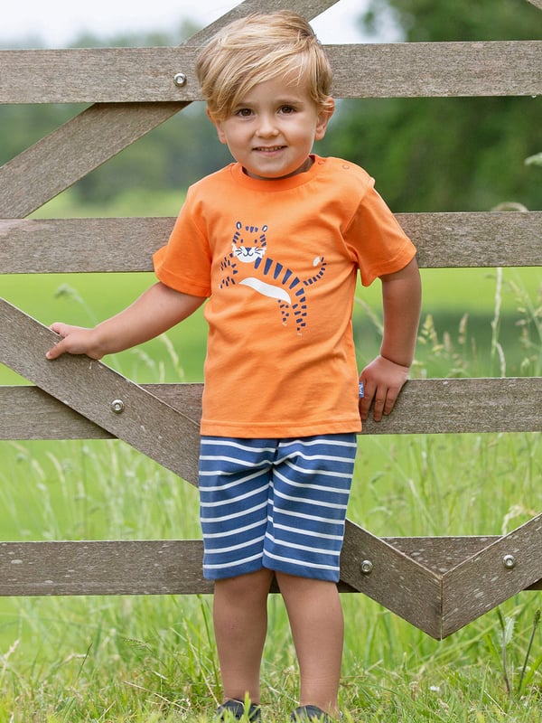 Being the largest wild cat in the world, tigers are pretty awe-inspiring creatures. This coral orange t-shirt displays Kite's regal friend with their terrific tiger print.