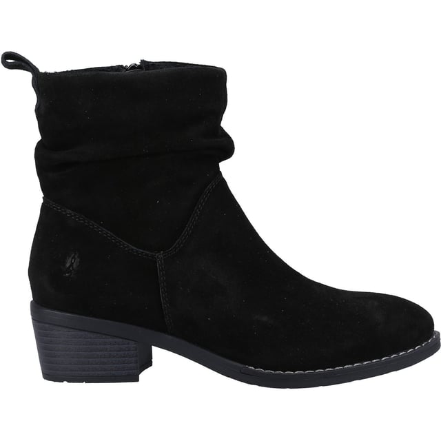 Hush Puppies Iris Suede Women's Black Boots The Iris boot is a super stylish choice for colder days, with it's ruched detailing and classic shape, as well as our WorryFree water resistant upper and soft fleece lining you can look your best whilst staying comfy and warm