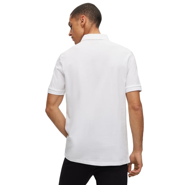 Men's polo shirt from the HUGO brand. Plain-coloured pique polo with woven label on the left chest. Made of pure cotton.
