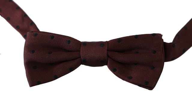 100% Authentic Dolce & Gabbana bow tie
  Exclusive item from the Dolce & Gabbana collection
  Color: Violet purple Dotted
  Model: Tied
  Material: 100% Silk
  Adjustable length neck strap one size
  Made In Italy
  Original tags & store bag included
Material: 100% Silk