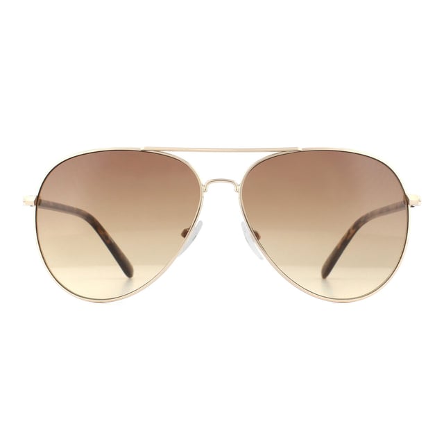 Calvin Klein Sunglasses CK19314S 717 Gold Tortoise Brown Gradient are a typical aviator style with large teardrop shaped lenses. A metal frame front features adjustable nose pads, and plastic temples showcase the Calvin Klein logo.