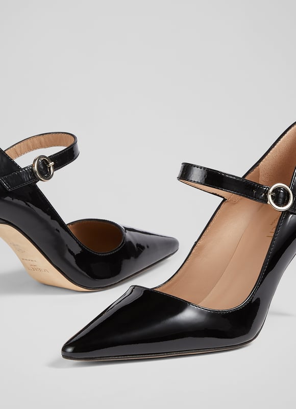 A sexy take on a classic style, our Camille Mary-Janes are the perfect courts for when things get dressy this season. Crafted in Spain from glossy black patent leather, they have a pointed toe, Mary-Jane styling with a round buckle and an 85mm stiletto heel. Wear them with slick tailoring or your favourite dresses.