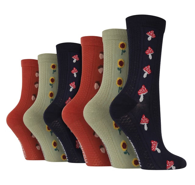 Experience joy and happiness with every step in the Wildfeet Multi Pack of Textured Socks. Designed to add a bit of fun to your feet, these socks are a perfect addition to any wardrobe. Ideal for Spring and Summer, these socks are sure to become your new go-to pair. These 6 packs offer a variety of stunning designs that will appeal to everyone. Each pair of socks is made with high-quality cotton-rich material to provide a soft, comfortable feel while allowing your feet to breathe. The fine gauge fibres ensure durability, so these socks will last wear after wear. Whether you're dressing up or down, these socks will be the perfect complement to your outfit. The pack is also an excellent gifting option as each pair features a different design, making them perfect for any day of the week. From bold and playful patterns to more subtle and understated styles, these socks offer something for everyone. Each pack contains three unique pairs of socks, allowing you to mix and match your look and express your individual style. Whether you're a fan of floral prints, mushroom motifs, starry patterns, or autumnal designs, these 6 packs have got you covered. Wild Feet is a range of socks featuring cool designs, bold colours and quirky catchphrases - from pugs and penguins, to lions and llamas! Choose from a range of styles for men and ladies, from dress to trainer socks. There are even some sporty styles available! There are 4 designs to choose from. They come in one size Ladies 4-8 UK, are made from 70% Cotton, 28% Polyester, 2% Elastane and are machine washable.