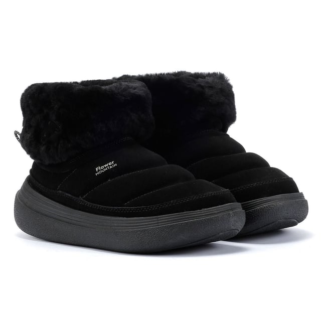 Suede ankle boot featuring cozy shearling lining, leather insole, and durable rubber sole with contrast tread for added grip.