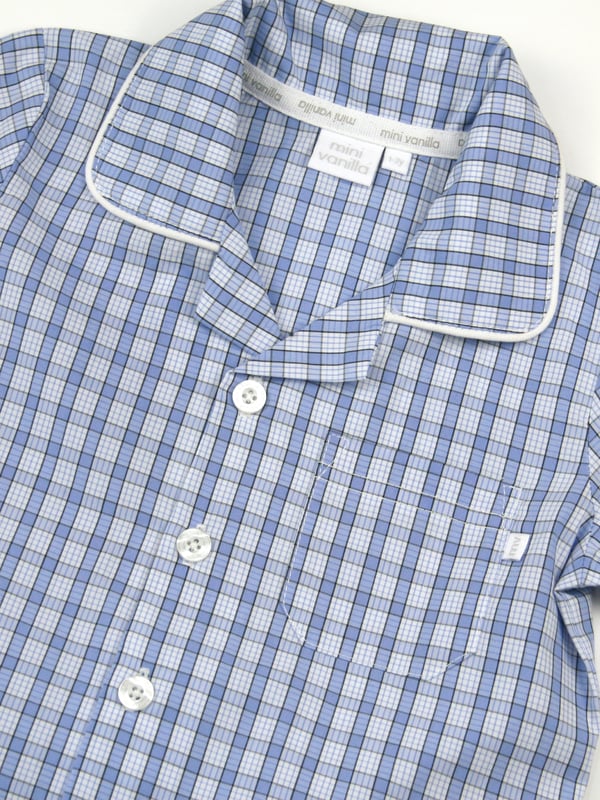 Boys mini check PJ with shorts in shades of mid blue. Spring & Summer weight 100% Cotton with short sleeves
Spotlight on Summer styling with our Traditional Shortie pyjamas, button through top with a front pocket and contrast piping. The shorts have an elastic waist, making them easy to get on and off.
100% Cotton
Elastic waist
Front pocket
Button through top
Machine washable
Contrast piping detail