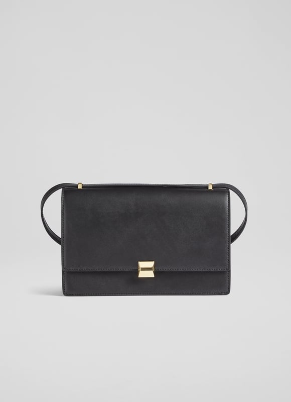 A new style in our LKB Conscious collection thanks to its vegan leather, the Ottie shoulder bag is planet-friendly and the perfect everyday bag. Crafted from soft and supple apple leather* in goes-with-everything black, it has a simple fold-over design with a chic gold clasp, an adjustable-length shoulder strap, and plenty of space with two interior sections and a slip pocket. Throw it on over weekday tailoring or a blazer and jeans at the weekend. 

*More about apple leather
Apple leather is created using technology that dries and flattens discarded apple skin, seeds and stalks mixed with resin to produce a leather-like material. Itâ€™s a responsible choice as apple leather is a vegan material that requires fewer fossil fuels than synthetic or animal alternatives.