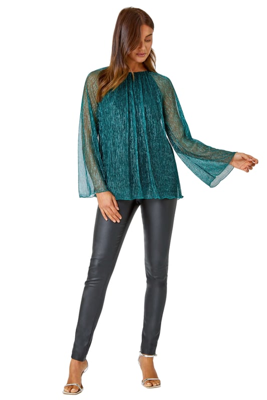 Plisse Overlay Wide Sleeve Top from Roman. Party all night in this plisse top! Cut from a glistening shimmer fabric, this top features a modest round neckline and extravagant wide sleeves to create a playful yet sophisticated style. Designed with a fitted underlay to keep you covered this top features a flirty keyhole cutout that accentuates the button fastening at the back of the neck. Pair with faux leather trousers and strappy heels and you’re sure to be the star guest at all of this season's parties!