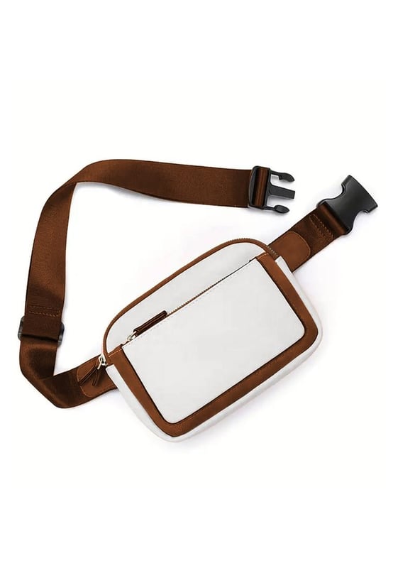 Verstellbarer Riemen für eine anpassbare Passform  
Unisex-Design  
Hergestellt aus hochwertigem PU-Leder  
Langlebig und stilvoll  
Perfekte Größe für die wichtigsten Dinge  
Material: PU-Leder