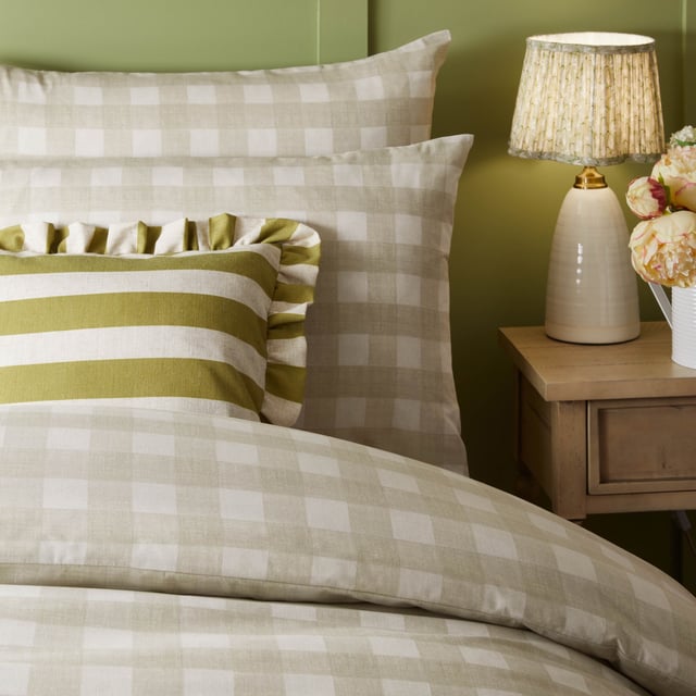 Transform your bedroom into an inviting sanctuary with the Hartsford Check Printed Duvet Cover Set. Crafted from a high-quality polycotton blend with a 144 thread count, this set offers a harmonious balance of softness and durability, ensuring restful nights for years to come. The timeless check print brings a subtle yet charming style to any interior, blending effortlessly with minimalist and classic aesthetics alike. Designed for those who value both style and practicality, this set combines understated elegance with everyday comfort, allowing you to express personality while creating an impression of effortless refinement in your home.