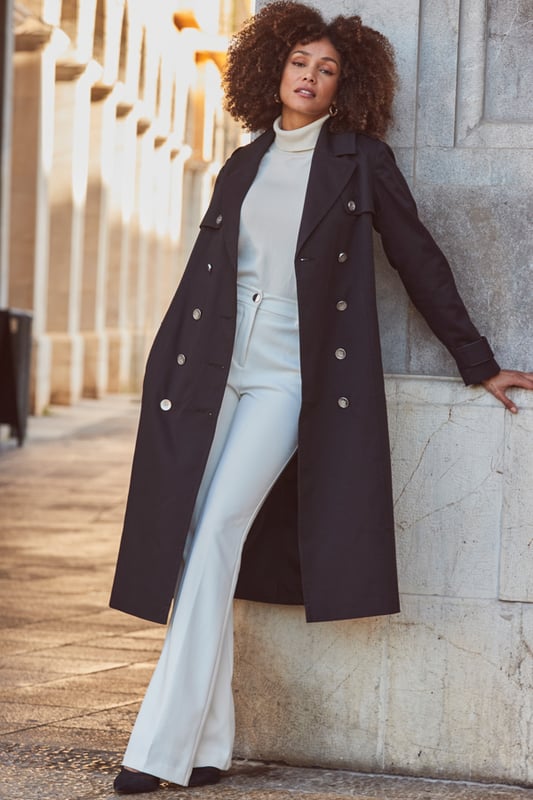 REASONS TO BUY:

Every wardrobe needs one
All the timeless trench details
Luxe faux leather trim
Longline hem to keep you cosy
Black goes with everything
Throw it over work and weekend outfits