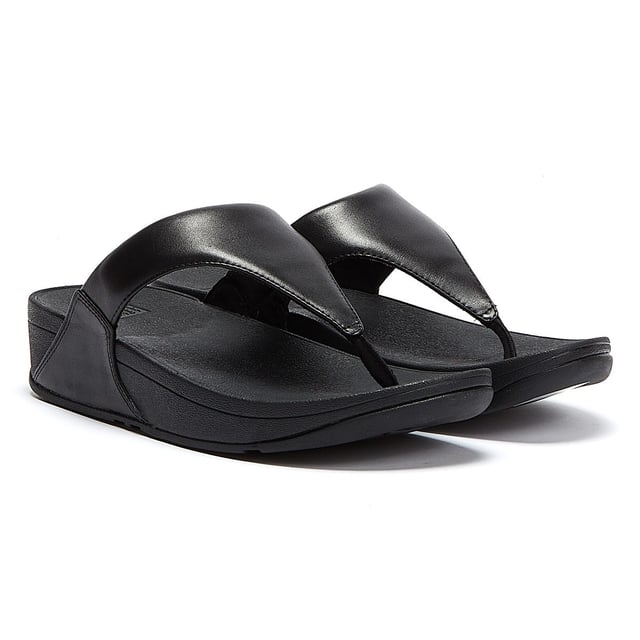 FitFlop Dames Lulu™ Sandalen - (Zwart) De Lulu™ sandalen van FitFlop zijn perfect voor het strand en de zomer. Slip on sandalen met leren bovenwerk en een Microwobbleboard™ tussenzool met driedubbele dichtheid die extra comfort biedt van schokabsorptie tot drukverspreiding. - APMA (American Podiatric Medical Association) Seal Of Acceptance om een goede voetgezondheid te bevorderen - Naadloos ingebouwd voetboogcontour - Slipbestendige rubberen buitenzool
