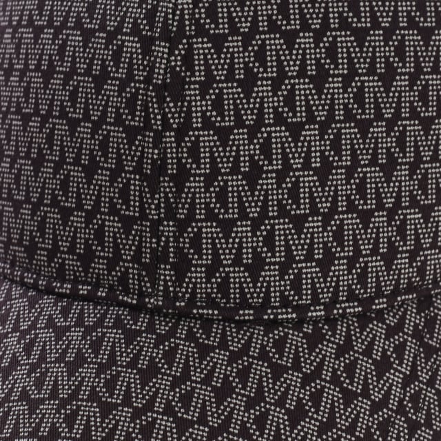 Michael Kors women's cap.
 Brand acronyms stamped consecutively.
 Strap with adjustable closure.
 Logo plate detail on the back.
 Seams seen in tone
 Composition: 97% Organic cotton, 3% Elastane
 Care:
Handwash.
 Dry horizontally.
 Iron at low temperature.
 Do not use bleach.