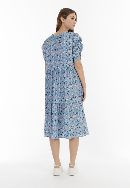 Verspreide bloemen voegen modieuze cool toe aan de jurk van myMo, in contrast met de gelaagde stroming en de pofmouwen met ruches. Gemaakt in Italië, komt dit ontwerp in een los silhouet en een comfortabele stretchstof.