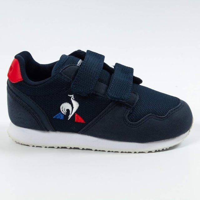 Basket Le Coq Sportif Jazy Inf Jungen Blau Textil. Authentischer Schuh von der Marke Le Coq Sportif - Streetwear/Sportswear Design von Le Coq Sportif - Le Coq Sportif für modebewusste Jungen, perfekt für den Alltag - Der blaue Basket Le Coq Sportif lässt sich ideal mit dem Rest deiner Garderobe kombinieren - Bequemes Textilmaterial - Klassischer Klettverschluss - Jazy Inf - Textil