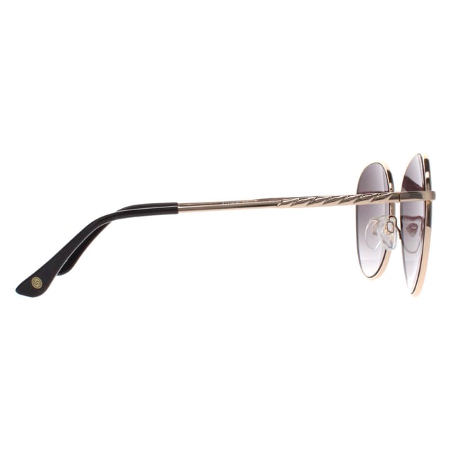 Smarty Round Unisex Gold Grey X1116  Sunglasses Elevate your style with SMARTY Designer Sunglasses model X1116B, perfect for both men and women who appreciate timeless elegance. These round-shaped sunglasses feature a luxurious gold metal frame paired with sophisticated grey gradient lenses, offering superior UV protection and a chic, polished look. The X1116B model combines classic design with modern comfort, making them ideal for any occasion. Available at an unbeatable discount from the regular retail price, these designer sunglasses provide exceptional quality and value. Enhance your accessory collection with SMARTY and enjoy luxurious sun protection that complements your unique style.