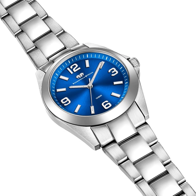 Would you like a watch with a timeless design in connection with your own character and excellent quality? Then this women's model of the Rhodenwald & Sons brand is the perfect choice. The watch manufacturer stands for stylish and sustainable masterpieces for all generations: the timepiece enthusiastic with a tidy dial, subtle line indices, Arabic figures, minute and luminal staff. The hard -wearing stainless steel housing and a suitable link strap made of stainless steel form an exciting contrast to the dark dial and fit harmoniously into the overall concept. A precise quartz watchwerk, a screwed housing floor and waterproof up to 10 ATM are also part of the exclusive equipment.
