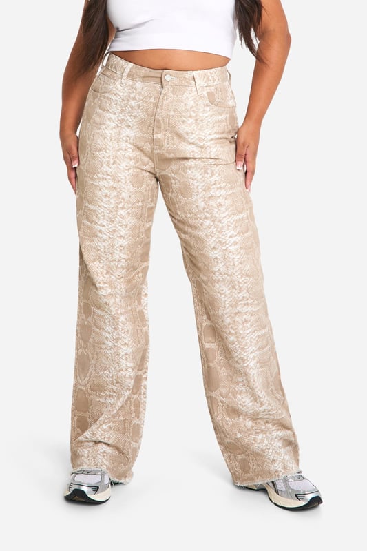 Wide leg silhouette for a relaxed, on-trend look
        Textured croc-print pattern adds visual interest
        High-rise waist for a flattering fit
        Denim fabric offers durability and comfort
        Versatile design suitable for various casual occasions
    
    Make a bold statement with these eye-catching plus-size jeans from Boohoo. The wide-leg silhouette combines comfort with style, while the unique croc-print pattern adds a touch of wild sophistication to your ensemble. Perfect for the fashion-forward woman who loves to stand out, these jeans can be dressed up or down for various casual events. Pair them with a crisp white crop top and trainers for a laid-back daytime look, or style with a sleek bodysuit and heeled boots for an evening out with friends. The high-rise waist flatters your curves, making these jeans an ideal choice for family gatherings or casual outings. Embrace your individuality and let your style roar with these standout denim trousers that are sure to turn heads wherever you go.