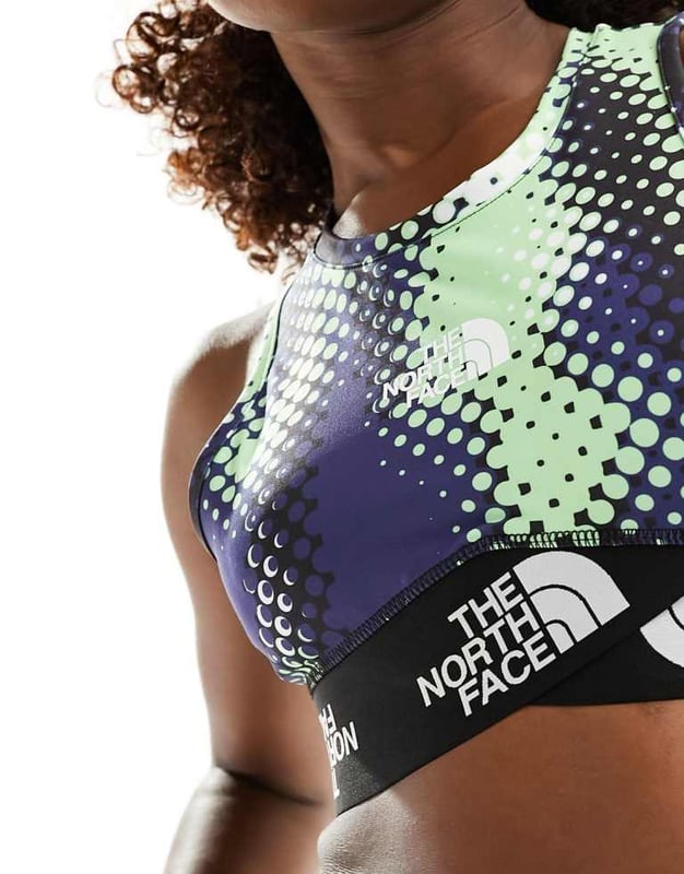 Tops by The North Face  All-over print Round neck Logo details Elasticated underband for a secure fit Racer back for unrestricted movement Slim fitSold By: Asos