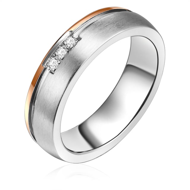 This extraordinary engagement ring of the 1934 manufactory combines all elements that love trend-conscious women: noble materials, durability, bicolor look and a touch of bling bling. The simple stainless steel ring inspires with partial gilding in a trendy rose gold and a fascinating groove contour. Three small zirconia stones in Brillantschliff make the ring sparkle - the perfect symbiosis of minimalism and glamor. It is a great advantage of stainless steel its scratch resistance and robustness at a favorable price, so that this engagement ring is not suitable as a bridal jewelry but also daily companions.