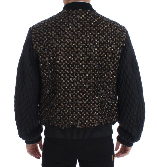 100% authentic Dolce & Gabbana black sequined jacket with gold detailing
  Straight from the Runway/catwalk
  Full zipper closure
  Four front pockets with zipper closure
  Two inside pockets
  Gold and black colored sequined detailing
  Quilted stitched arms
  Warm inner lining
  Logo details and logo engraved metal detailing
  Made in Italy
  Material: 35% Goatskin Leather 30% Lana wool 20% Glass 10% Plastic 5% Wool
  Lining: 42% Rayon 42% Acetate 16% Goatskin
Material: 35% Goatskin Leather 30% Lana wool 20% Glass 10% Plastic 5% Wool