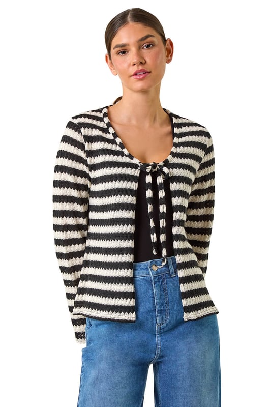 Striped Print Tie Detail Cardigan from Roman. Stay warm and stylish this Autumn with our stripe print cardigan. Crafted from a cosy pointelle knit fabric, this cardi features a trendy tie front fastening, perfect for layering on those cooler days. The hip-length design and long sleeves ensure a comfortable and flattering fit. Pair with jeans and ankle boots for a chic and effortless daytime style.