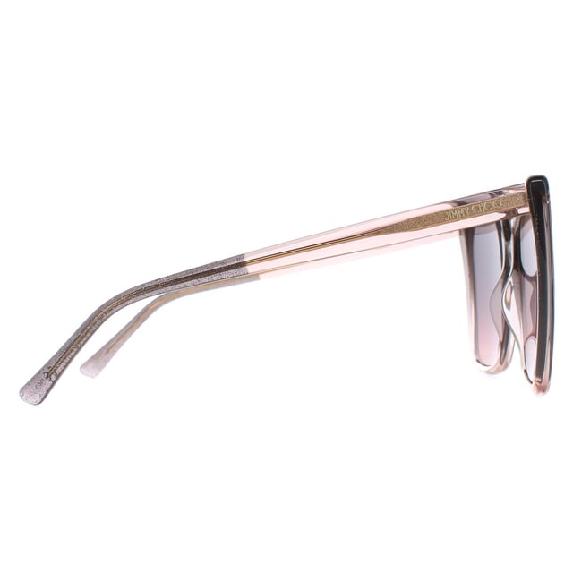 Jimmy Choo Cat Eye Womens Nude Glitter Grey Fuchsia LESSIE/S  Sunglasses are a stylish cat eye frame, enhancing your facial features while providing optimal sun protection. The high-quality acetate material used in their construction ensure durability and comfort, making them the ideal companion for both everyday wear and special occasions. The Jimmy Choo logo features on the temples for brand authenticity.