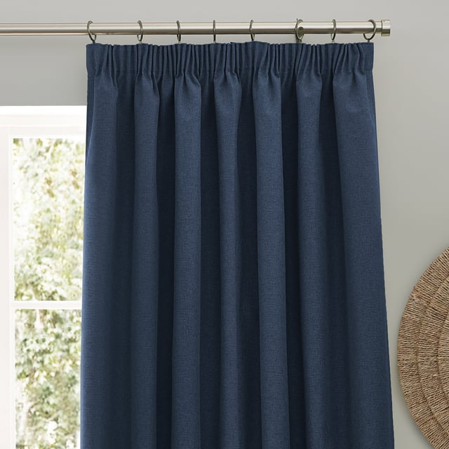Transform your living space with Dawn Blackout Pencil Pleat Curtains, designed for those who value elegance and practicality. Crafted from soft-textured fabric with a modern marl effect, these curtains add refined style to any room while effectively blocking out light. Perfect for a restful night's sleep or creating the ideal movie-watching environment, their temperature-regulating properties ensure comfort year-round by keeping your home cool in summer and warm in winter. Enjoy the perfect blend of function and style with Dawn Blackout Curtains.