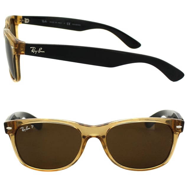 Ray-Ban Sunglasses New Wayfarer 2132 945/57 Honey Crystal Brown Polarized 55mm are an updated and slightly smaller interpretation of the Original Wayfarer. They feature a softer eye shape and sculpted temples that display the iconic Ray-Ban logo. The New Wayfarer 2132 are a versatile and playful choice that are available in countless colourways and the lightweight acetate frame is comfortable and easy to wear. The softer style of the 2132 suit more face shapes and is perfect for somebody that loves the Original Wayfarer design but is looking for a less dramatic look.
