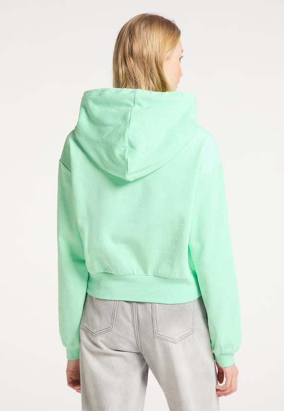 Une capuche confortable, un tissu sweat doux et des poignets côtelés confèrent au sweat à capuche de myMo un look cool et confortable. La petite broderie florale sur la poitrine complète parfaitement le design casual-fit décontracté.