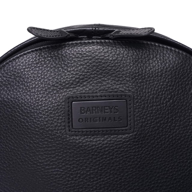 Barneys Originals real leather backpack featuring a bold cherry red stripe for an elegant touch. Designed with comfort fabric on the back to ensure easy, comfortable use throughout the day.
