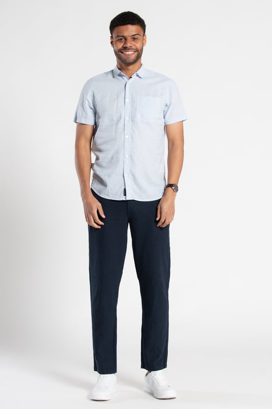 Blue Linen Blend Short Sleeve Button-Up Shirt With Chest Pocket Upgrade your summer wardrobe with this short-sleeved, linen shirt from Tokyo Laundry. Made from a breathable blend of linen and cotton, this shirt offers comfort and style with its classic fit. The shirt features button fastening and a chest pocket. Machine washable for easy care.