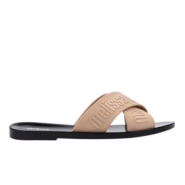 Join the multistrap trend with the Melissa M Lover Slide, the ticket to becoming a footwear icon! Lightweight and available in a variety of delightful colors, the sandal is inspired by the current fashion scene and features the unmistakable Melissa charm. Grab the perfect pair, pronto!