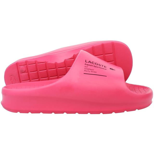 The Lacoste Serve Slide 2.0 223 2 CFA Women's Pink Sliders are a stylish and comfortable option for casual wear, poolside relaxation, or beach outings. With a sleek design and a soft pink colorway, these sliders bring a touch of elegance to your everyday look.
Â 
Key Features:
Ergonomic Footbed: 

Contoured for superior comfort and support, making them perfect for all-day wear.


Durable Synthetic Strap: 

Features the iconic Lacoste crocodile logo embossed for a chic and recognizable touch.


Slip-On Design: 

Offers easy on-and-off wear, ideal for quick outings or relaxed settings.


Textured Rubber Outsole: 

Provides excellent grip and stability on both wet and dry surfaces, ensuring safety in various environments.


Lightweight Construction: 

Minimizes fatigue, allowing for extended comfort during wear.


Water-Resistant Materials: 

Suitable for pool, shower, or beach settings, designed to withstand water exposure without compromising quality.


Soft Pink Colorway: 

A feminine and versatile shade that complements casual, summer, or athleisure outfits.


Â 
The Lacoste Serve Slide 2.0 223 2 CFA Women's Pink Sliders are the perfect combination of functionality and style, making them a go-to choice for relaxed, everyday wear or sunny getaways.
Â 
Â 
Â 