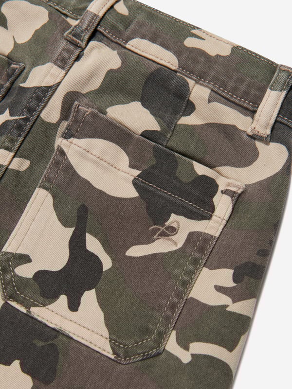 DL1961 project their sustainability ethics into their new revolutionised denim fabrics. This girls Jenny star camo green mini skirt captures the label's distinctive craftsmanship and rebellious nature. Made in recycled fibers, it features buckle insertions, a frayed edge, pockets and raw stitched embroidered stars. Match with the Jackson cargos or the Rocco utilitarian jacket for an extra impact. Denim Recycled Fibers  Clean Dyes  Solar Power  Less than 10 Gallons Of Water  Zip-Up Fastening  Buckle Insertions Pockets  Embroidered Stitches Detailing DL1961 : Girls Height8Y: 51-52.5" / 129cm 10Y: 53-55" / 134cm 12Y: 55.5-58" / 140cm14Y: 58.5-61" / 148cm16Y: 61.5-62.5" / 156cm