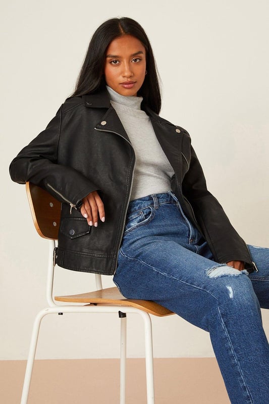 Meet layers you'll love. Whatever the weather, we've got the jacket & coats for you. From iconic coats to puffers and wool look coats, our new-in styles have you covered for every season. Think faux fur, shackets, sleeveless gilets and more. With DP it's never been easier to make a style statement. Style: Petite Faux Leather Biker Jacket.  Ideal for: Daywear.  Model wears size UK 10 and is 5' 3" tall.