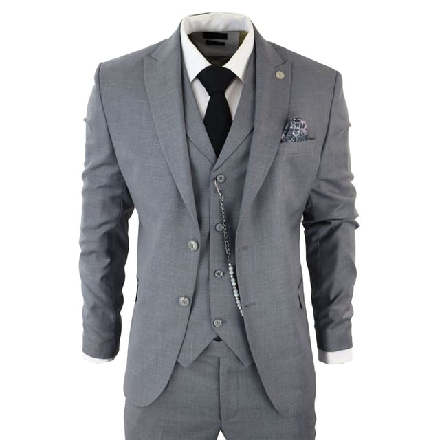 Step into sophistication with our Classic and Elegant Design men's 3-piece suit, featuring a timeless Grey color with contrasting pocket trims and a sophisticated textured pattern fabric, perfect for formal occasions. Product Design Bullet Points:  
Versatile Formal Attire: Suitable for weddings, business events, or special occasions, ensuring a sharp and well-dressed look. 
Complete 3-Piece Set: Includes a jacket, vest, trousers, and pocket chain for a polished and coordinated outfit. 
Premium Material: Crafted from high-quality materials for comfort and durability, ensuring long-lasting style. 
Sophisticated Textured Pattern Fabric: Adds a touch of elegance and refinement to your formal ensemble. 
Contrasting Pocket Trims: Enhances the visual appeal of the suit, adding depth and dimension to your look.  Made from a blend of 65% Polyester, 32% Viscose, and 3% Lycra for a comfortable and stylish finishSizes	Jacket & Trouser Size
36R :	36" (Chest) 30" (Waist)
38R :	38" (Chest) 32" (Waist)
40R :	40" (Chest) 34" (Waist)
42R : 	42" (Chest) 36" (Waist)
44R :	44" (Chest) 38" (Waist)
46R : 	46" (Chest) 40" (Waist)
48R :	48" (Chest) 42" (Waist)
50R :	50" (Chest) 44" (Waist)
52R :	52" (Chest) 46" (Waist)
54R :	54" (Chest) 48" (Waist)