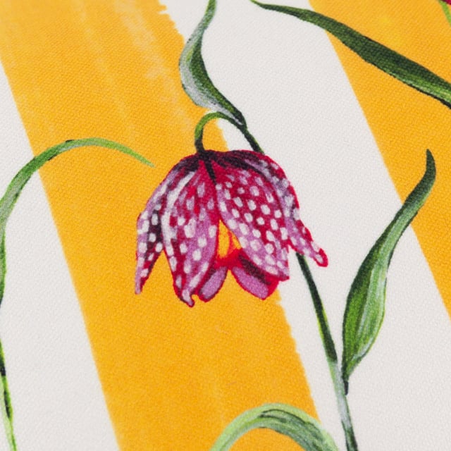 Elevate the charm of your space with the Marais Fritillaries Printed Ruffle Cushion, a delightful blend of artistry and comfort. Featuring a digitally printed, hand-painted design of delicate floral motifs set against bold, contrasting stripes, this cushion brings a vivid touch of the natural world into your home. The luxuriously soft chenille fabric and playful ruffle trim add texture and a sense of relaxed sophistication, making it an eye-catching statement or a perfect companion to complement modern country interiors. Whether nestled on a sofa or placed on a bed, it effortlessly combines elegance with a sense of fun, transforming any setting.