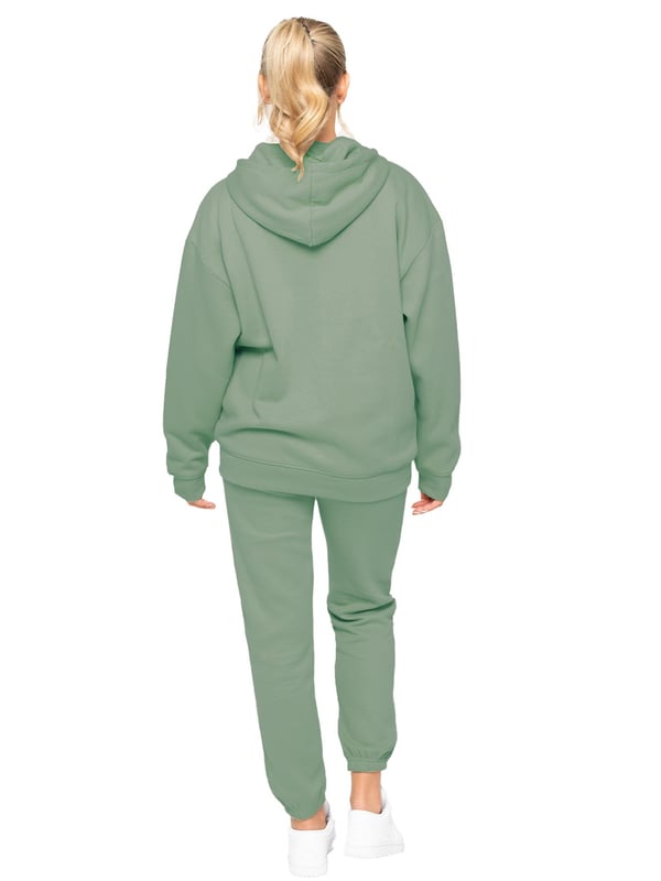The Enzo Women's Zipped Hoodie boasts an oversized fit with a convenient zip-up design and adjustable drawstring hoodie. The cuffed wrists and brushed back inner fleece ensure maximum comfort, making it the perfect choice for casual wea