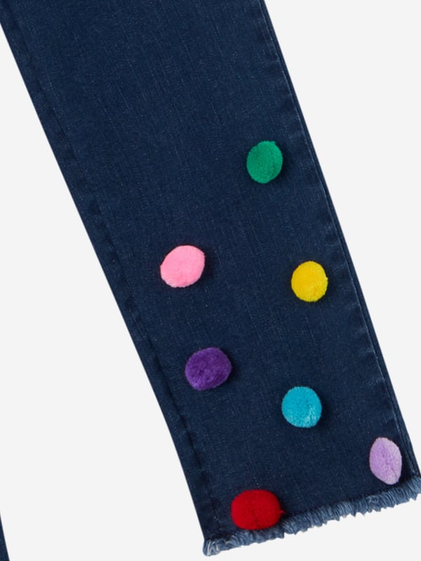 Introducing the Stella McCartney Girls Pom Pom Jeans in Blue ‚ a luxurious must-have for AW2024. These designer jeans blend whimsy with sophistication, perfect for your young fashionista. Key features include: Distinctive Pom Pom Details: Charming pom poms add a fun, eye-catching twist. Premium Comfort Fit: Crafted with soft, high-quality fabric ensuring all-day comfort. Versatile Blue Hue: Easily coordinates with various tops and accessories.Revamp her wardrobe with Stella McCartney‚  creative flair. Order now to add exclusive style to her adventures!