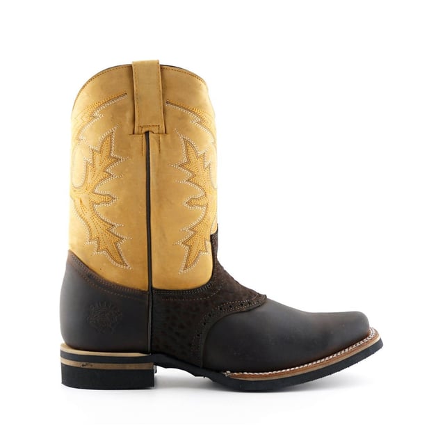 The Grinders El Paso boot is a standout style which includes colour contrasting panels separating the heel, vamp, and shaft which creates a great eye-catching aesthetic between the tan and black. The upper is crafted from top quality heavyweight leather and sports an eye-catching stitched design which is also seen on the vamp. This boot features a comfortable leather lining and insole, as well as a 1.5” block heel and a square toe front. The outsole is welted using the dependable Goodyear method and you can find the iconic Grinders Bulldog engraved into the bottom of the sole and heat embossed onto the outer side of the heel. • Goodyear Welted sole • Leather upper with detailed stitched design • Soft Leather lining • Stacked 1.5” block heels • Leather Soles • Made in Mexico