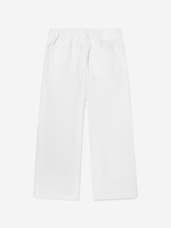 Introducing the Kids Metallic Effect Jeans in Silver from mm6_maison_margiela, a high-end designer piece for your Boy or Girl. Enhance their style quotient with these key features: Bold and shiny: These metallic effect jeans are sure to grab attention with their bold and shiny look. They're the ultimate statement in kids' fashion.  Comfortable Fit: Crafted from high-quality materials that conform to the body comfortably, these jeans are perfect for all-day wear. Unisex Design: Suitable for both Boys and Girls, these unique jeans fits seamlessly into any junior wardrobe.Revamp your child's fashion game with these lavish Kids Metallic Effect Jeans in Silver. Let them shine bright with mm6_maison_margiela! Order today.